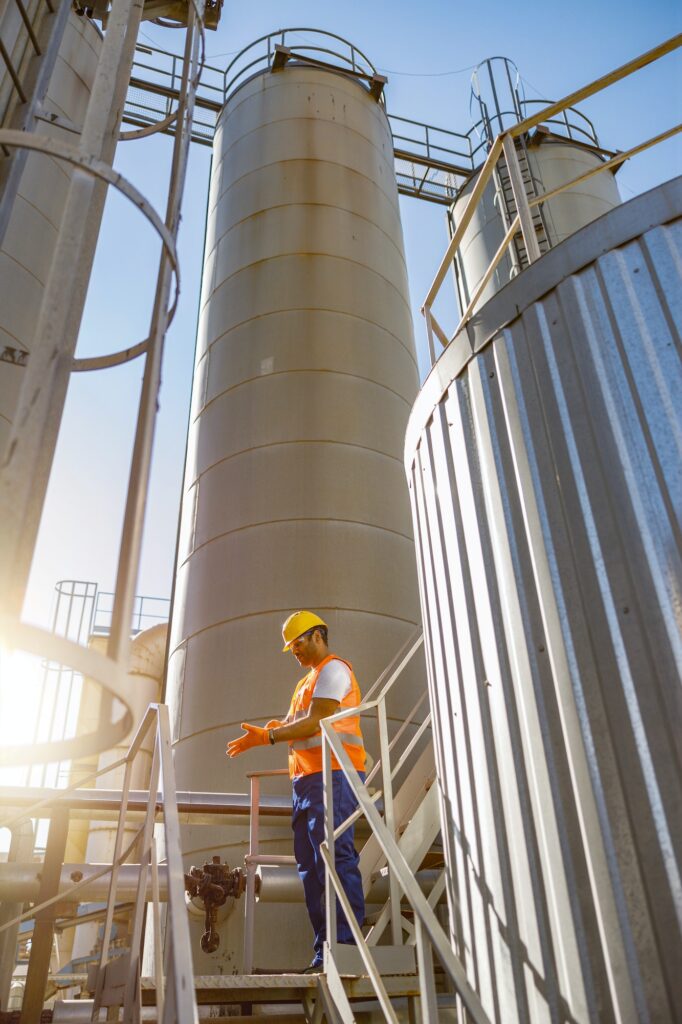 Construction engineer working with equipment in plant